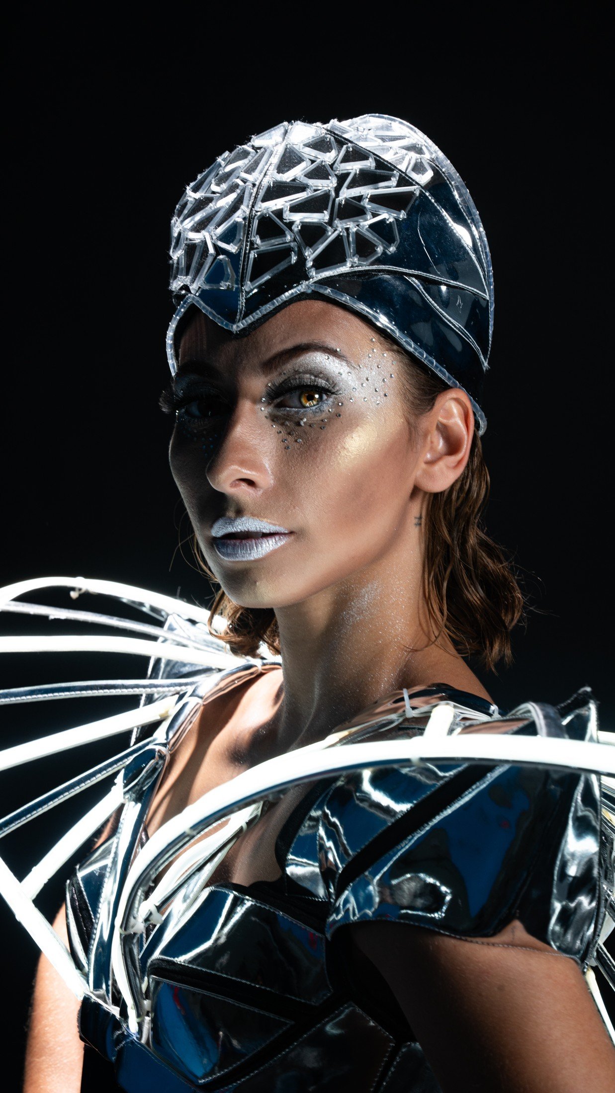 Fashion portrait in silver costume